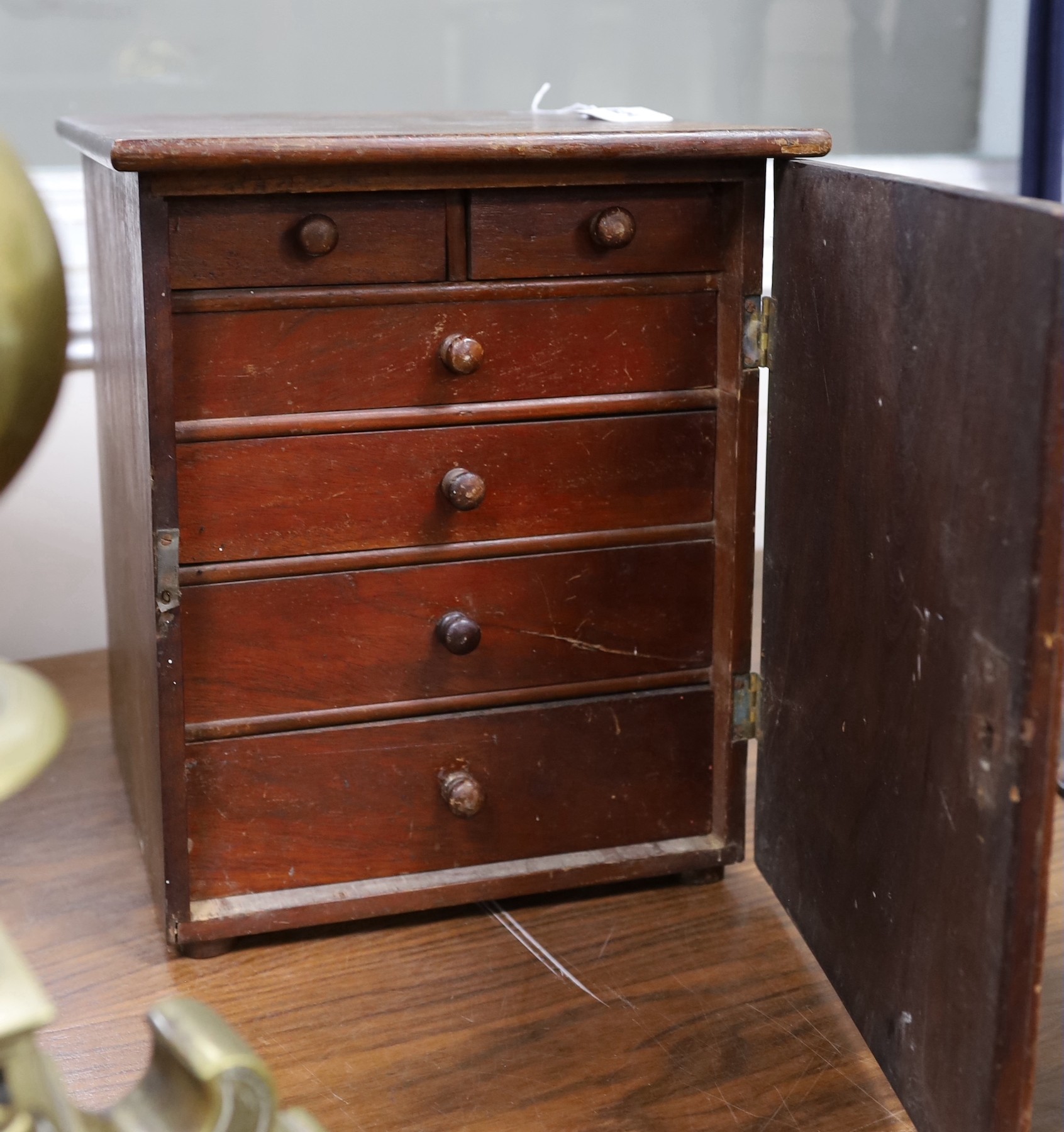 A mahogany collector's chest. 36cm high